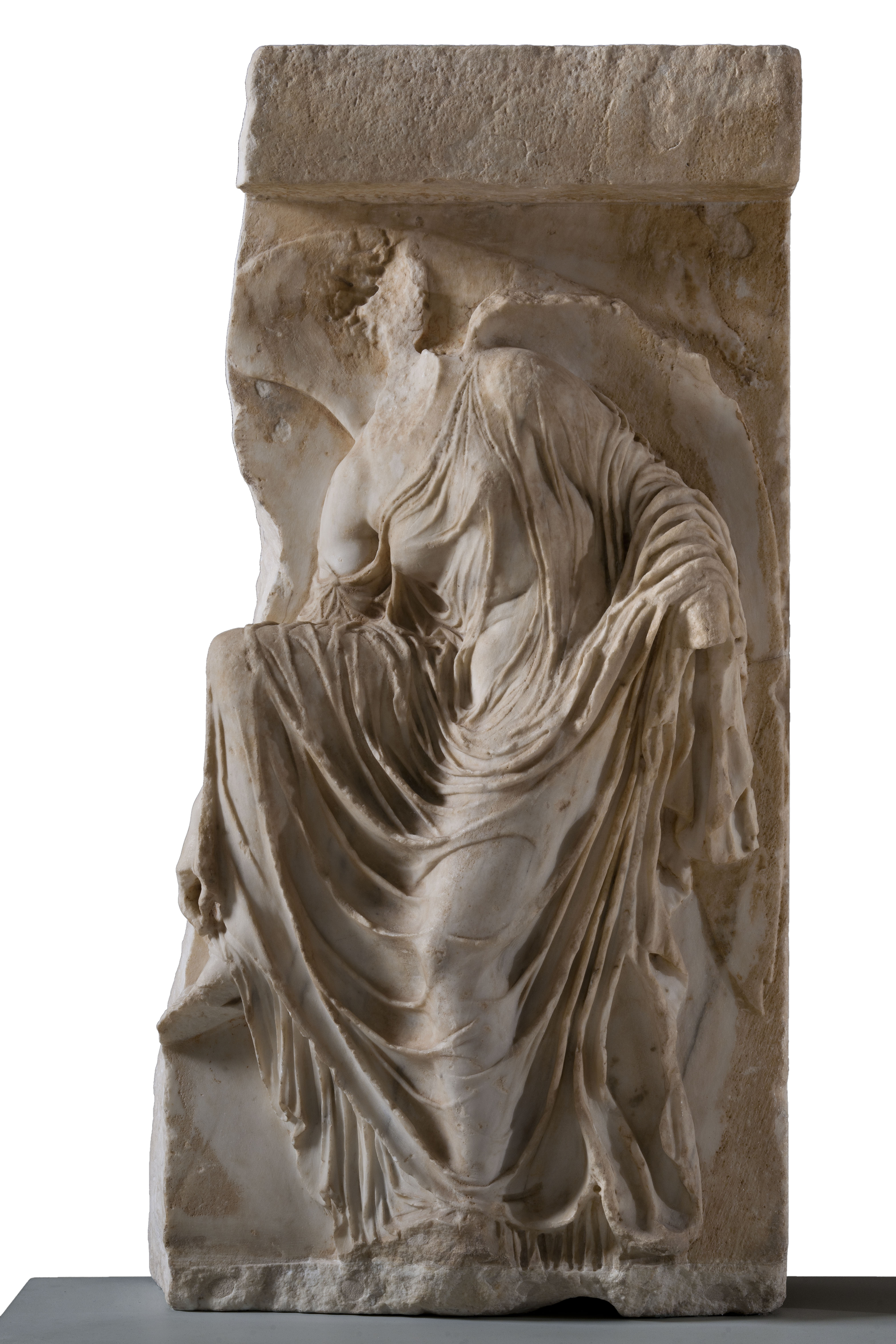 Part of a relief slab with a winged Nike, the “Sandalbinder”